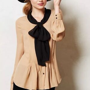 Leifsdottir bowed peplum blouse